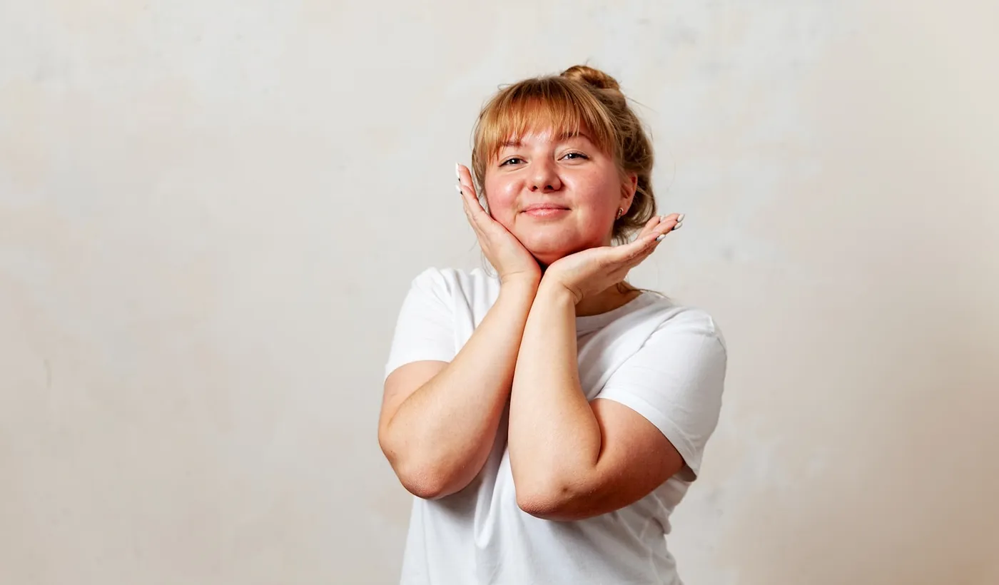 Person holding their face while learning about hemiplegic migraine and stroke-like symptoms