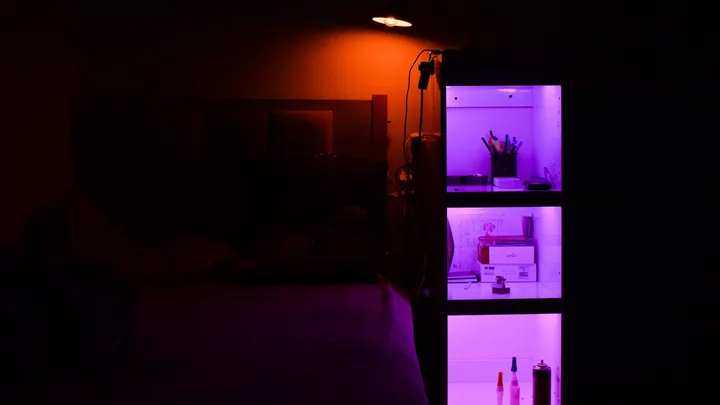 Dark television screen in a quiet, low-light room